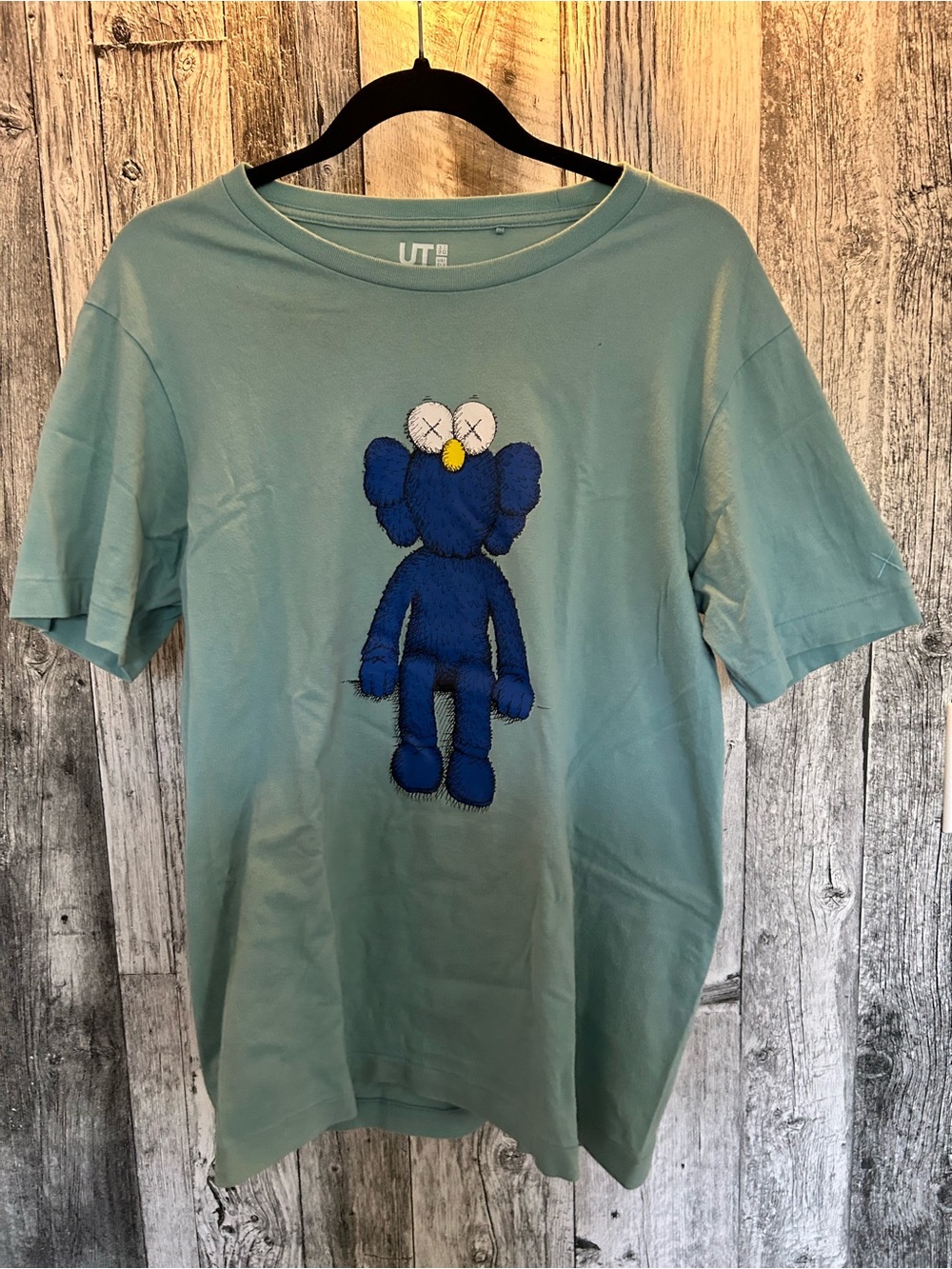 KAWS Kids Light Teal Graphic Tee with Blue Character Patch